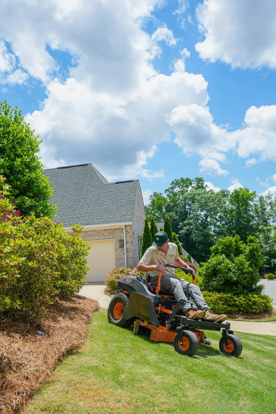 Zero-turn mowing a residential front yard